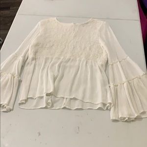 white long sleeve ruffled shirt